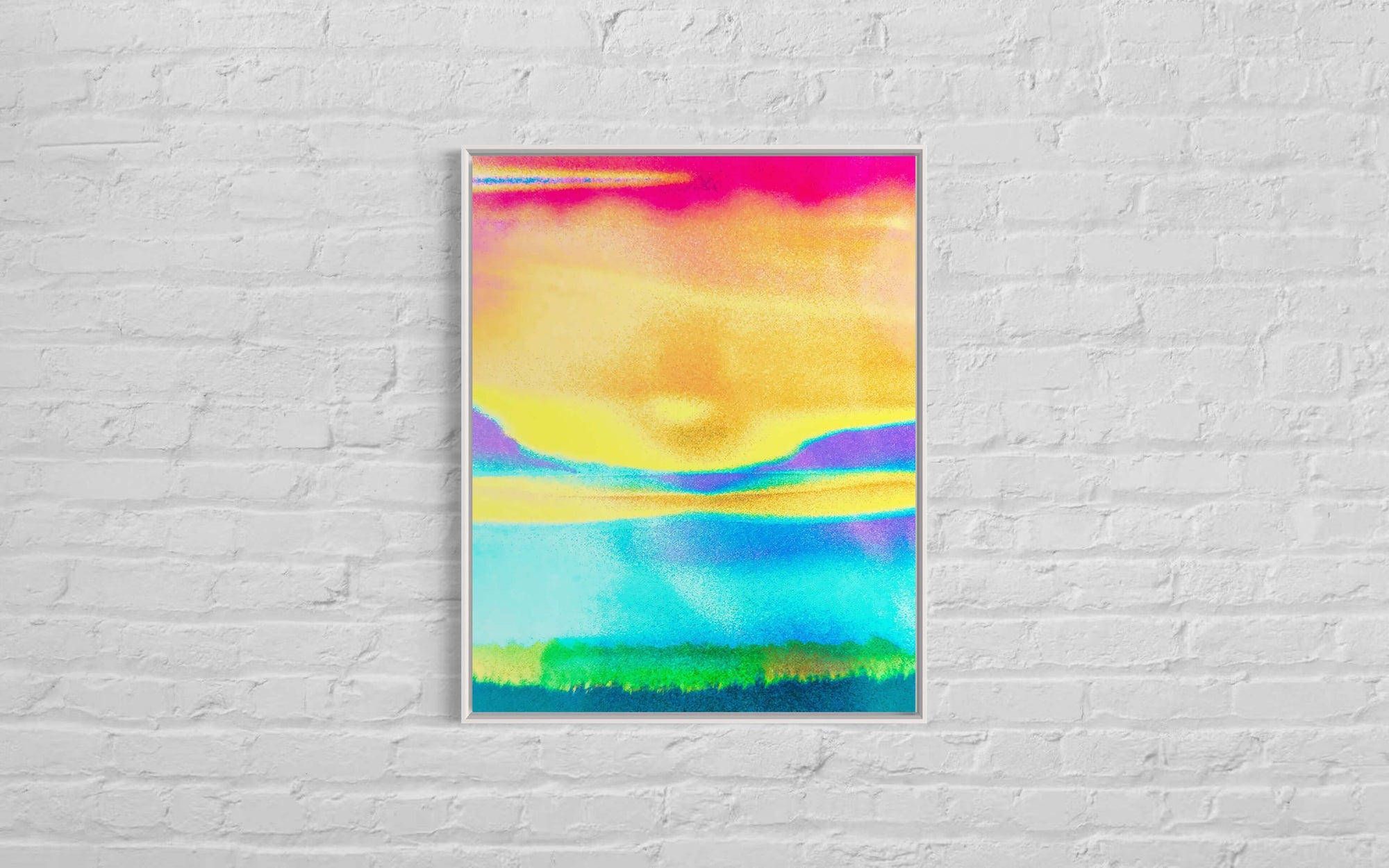 The image features "Raising Energy I," an artwork against a white brick wall. This piece is rich in fluorescent colours: yellows and oranges in the centre blend into blues and greens at the bottom, with a stripe of pink at the top. It gives the impression of a radiant, colourful sunrise that's full of life and energy. Its vivid colours stand sharply against the wall’s stark background.