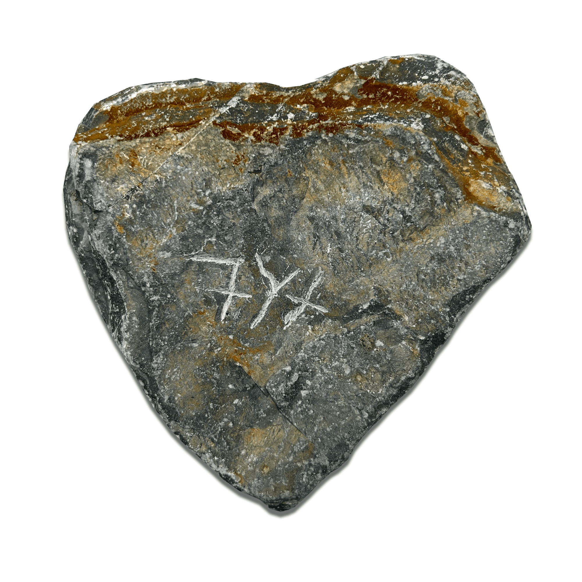A heart-shaped rock featuring an engraving, showcasing natural textures and colors.