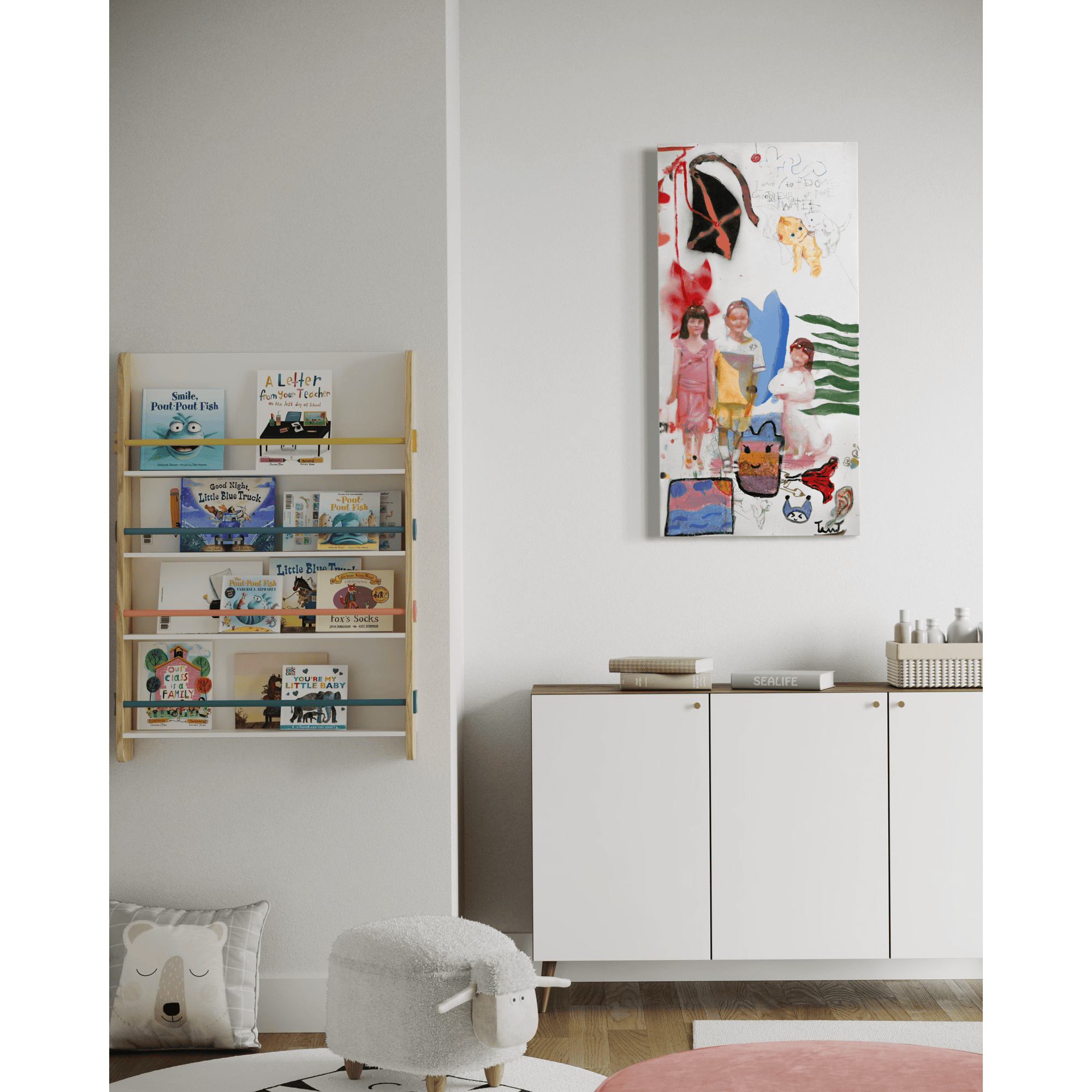 Living room displaying an abstract painting by Yasy Bachurina and a wooden bookshelf filled with children's books.