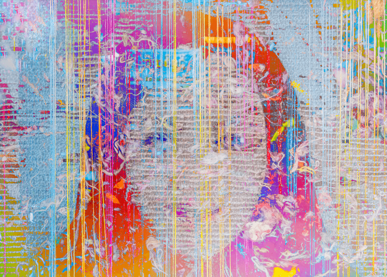 Abstract colourful artwork with the impression of a face.