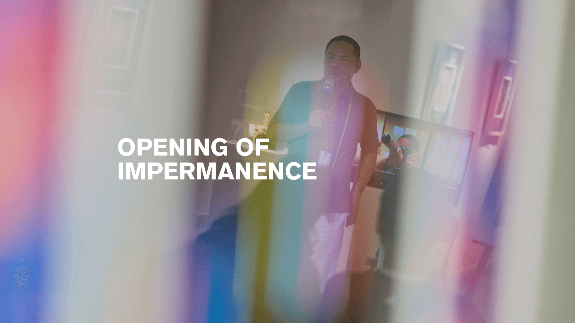 IMPERMANENCE exhibition opening featuring attendees enjoying the art.