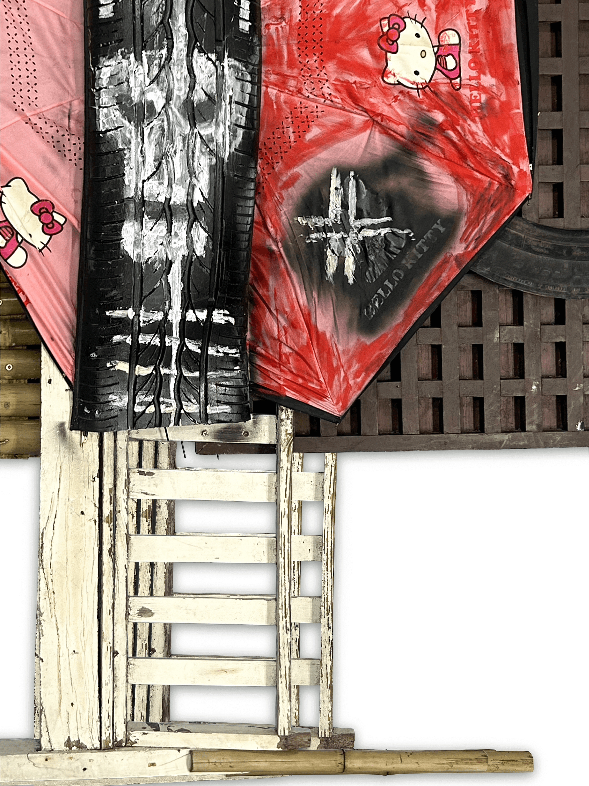 Artistic arrangement of Hello Kitty-themed textiles and wooden structures, showcasing vibrant colors and unique textures.