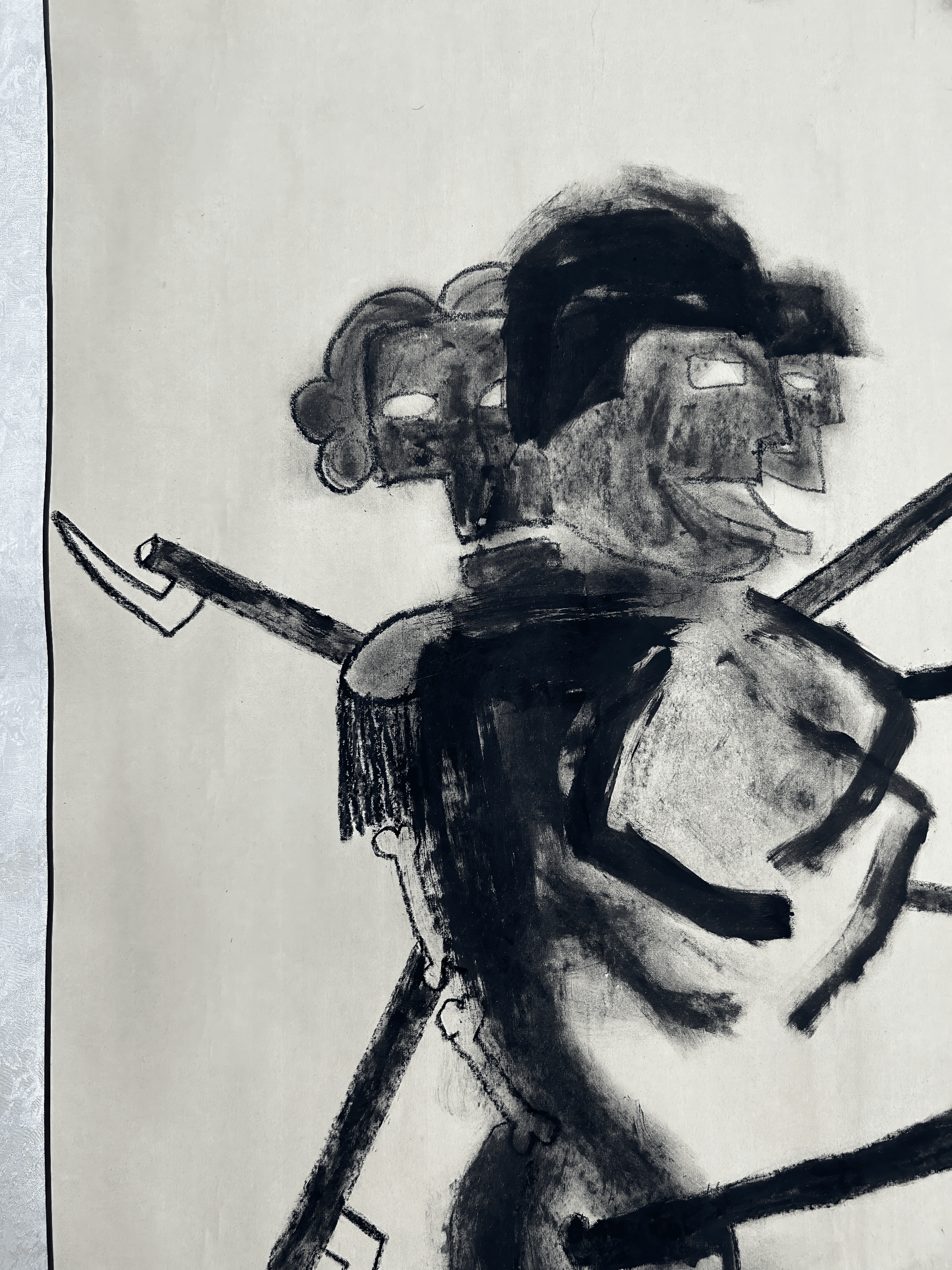 Abstract artwork depicting distorted human figures with angular lines and expressive brushstrokes.