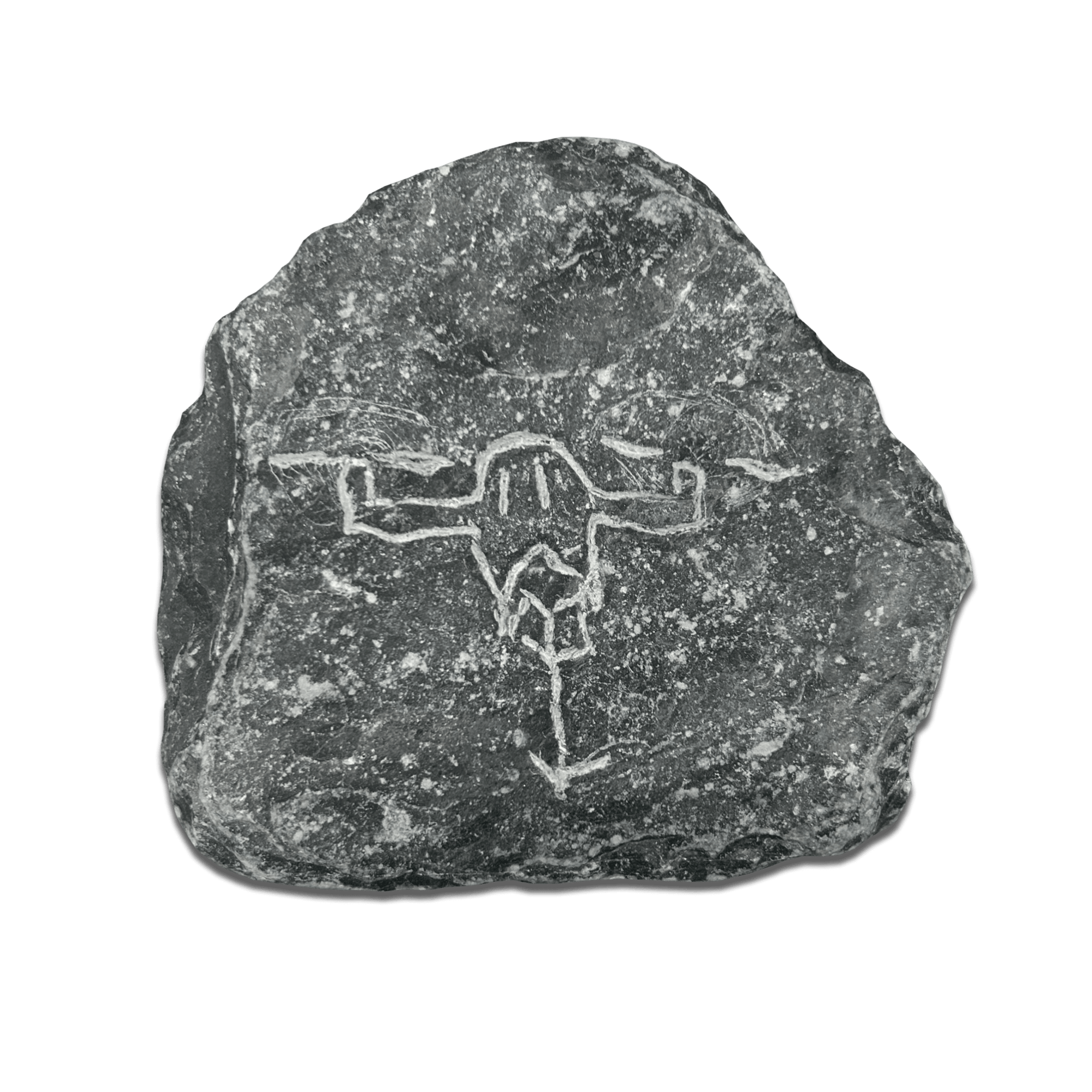 Carved petroglyph on a black stone, depicting a figure with outstretched arms.