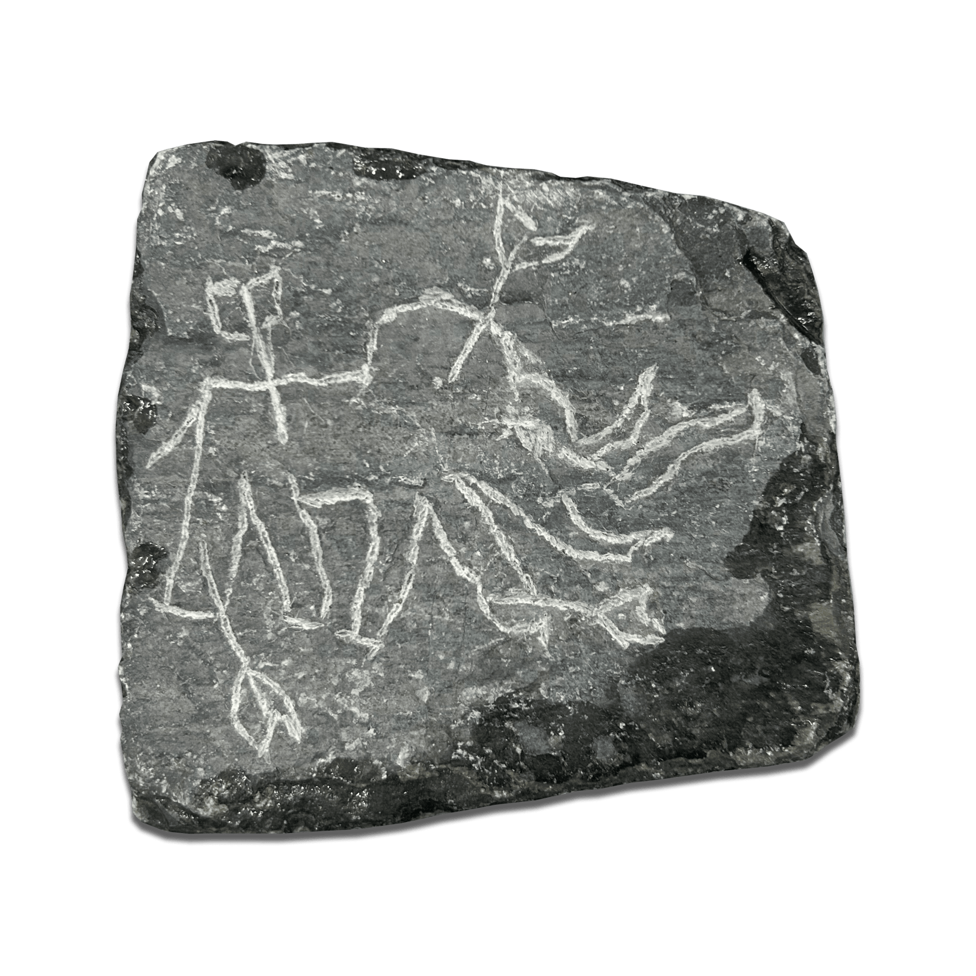 Petroglyph on a stone slab depicting a human-like figure with elongated limbs and plant symbols.
