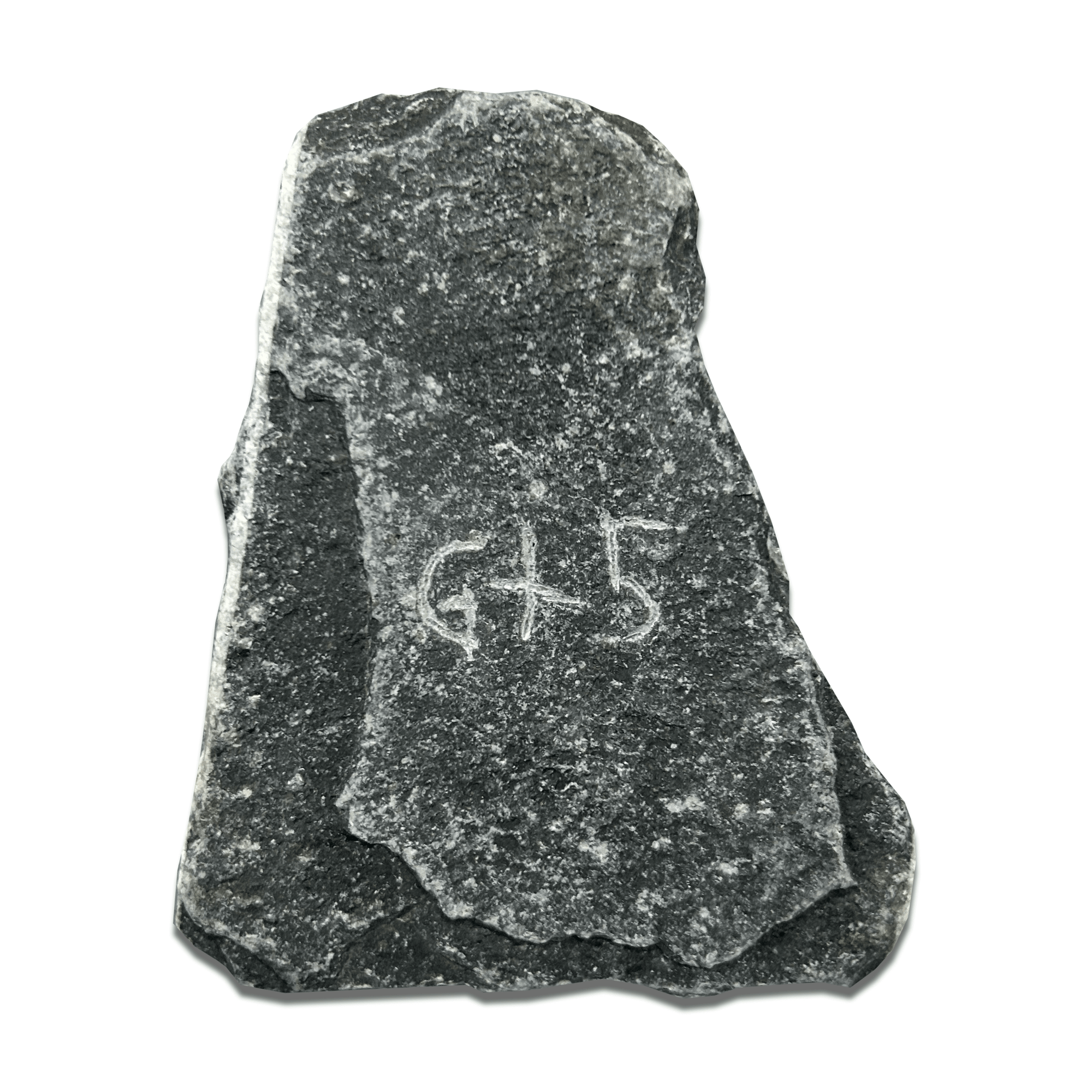 Dark gray stone with engraved markings, featuring the letters G and 5 on its surface.
