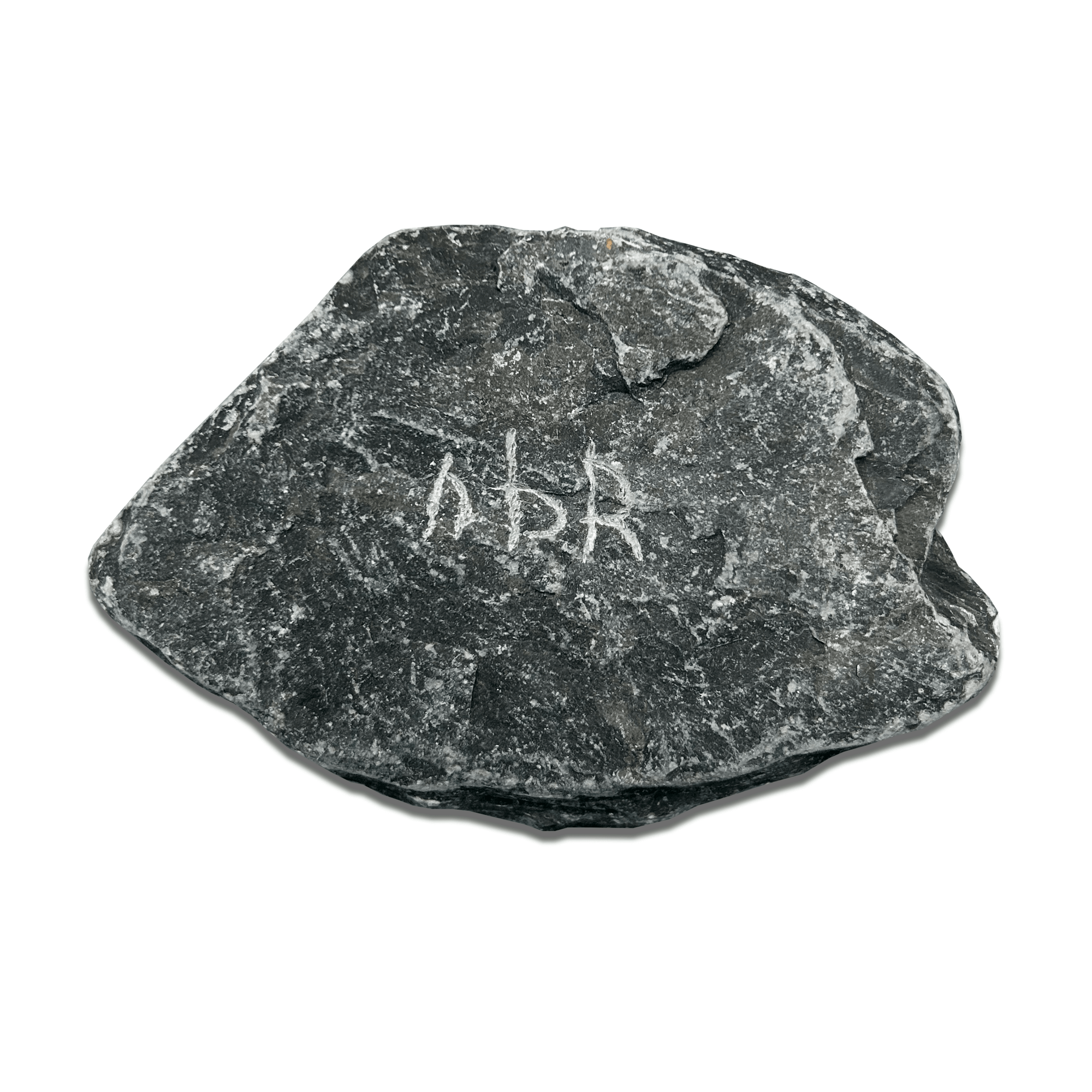 Raw stone with engraved markings, ideal for geological analysis and decorative purposes.