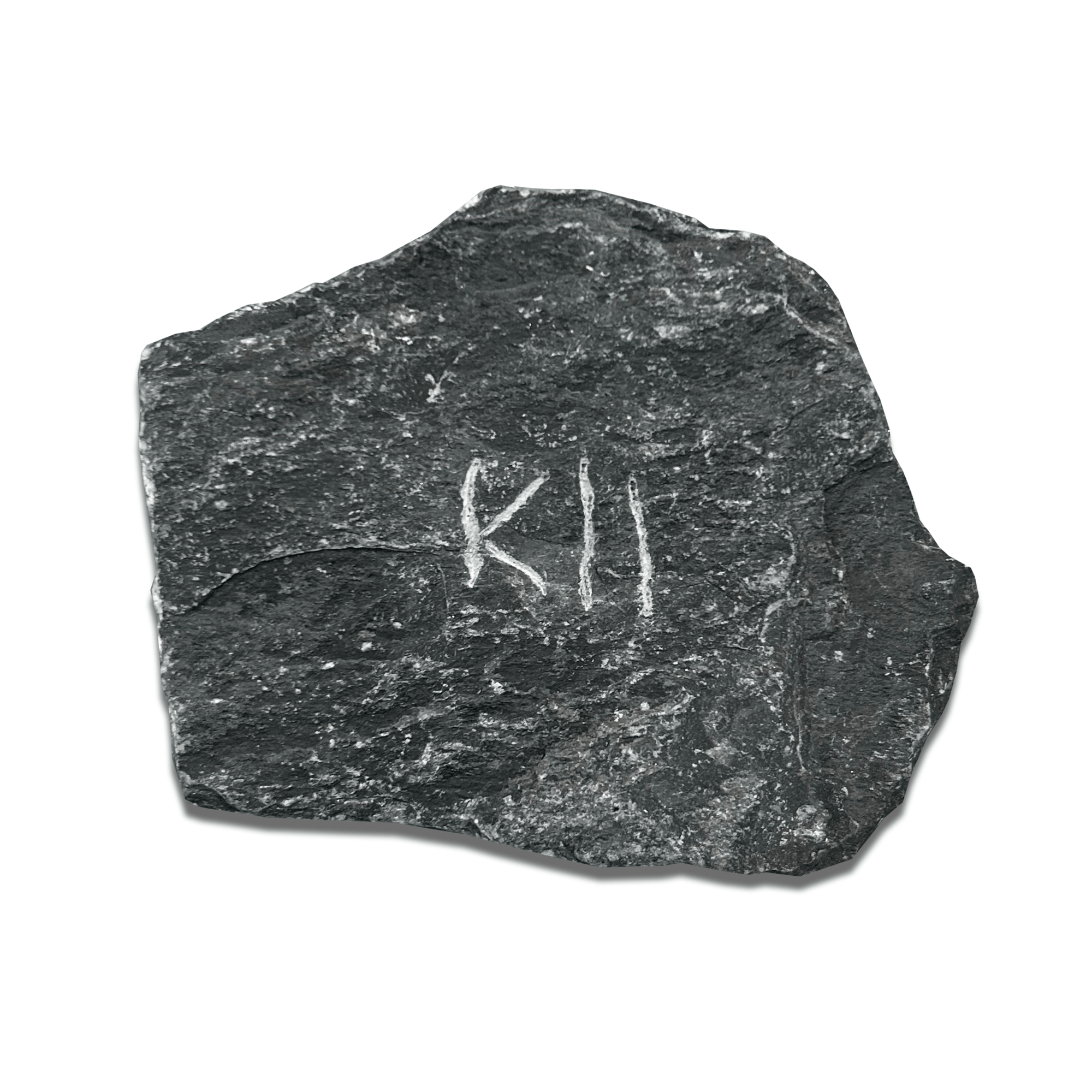 Gray rock with an engraved marking reading 'K11', suitable for archaeological display.