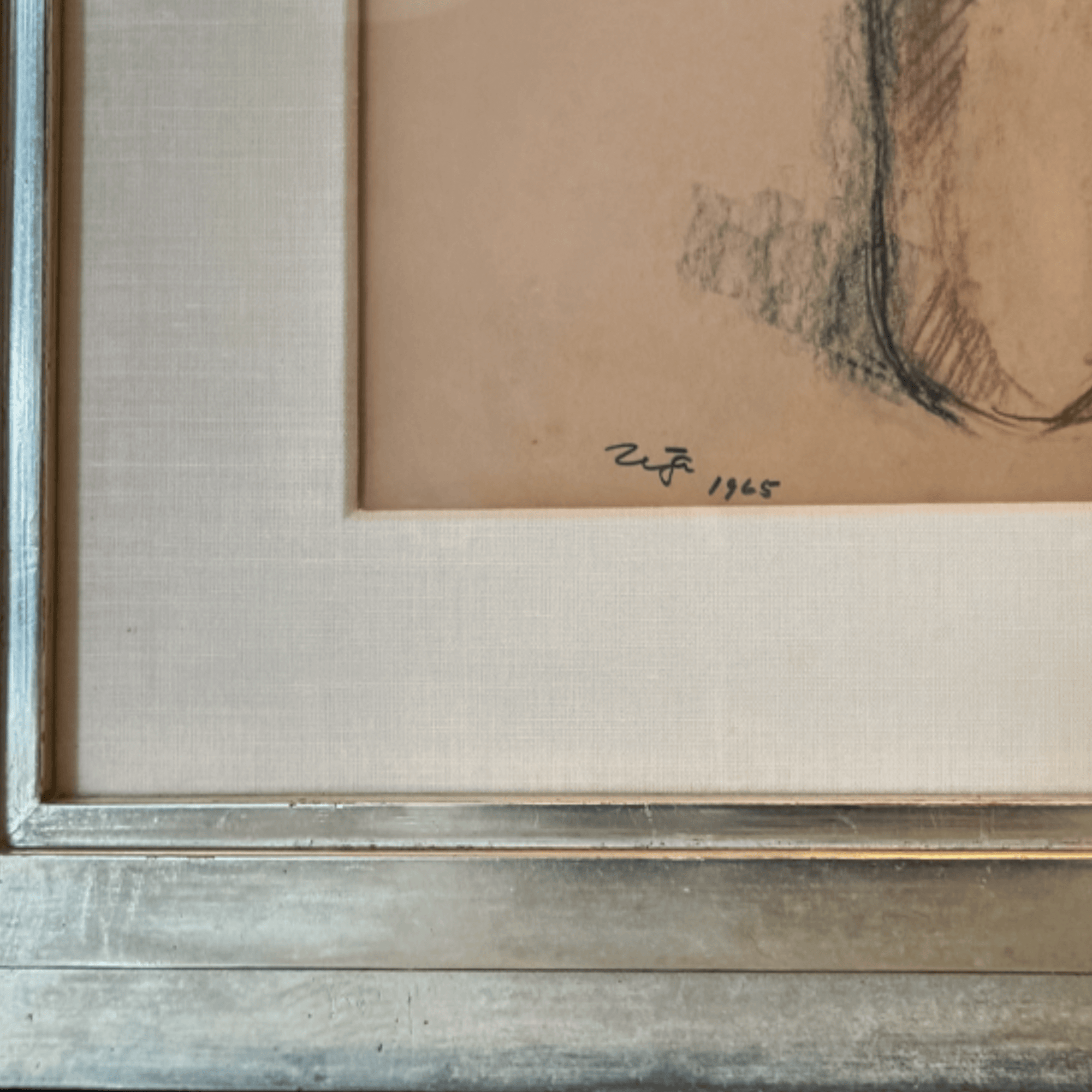 Close-up of Desnudo by Francisco Zúñiga, 1965, charcoal and sepia on paper, framed in white gold leaf with signature visible.