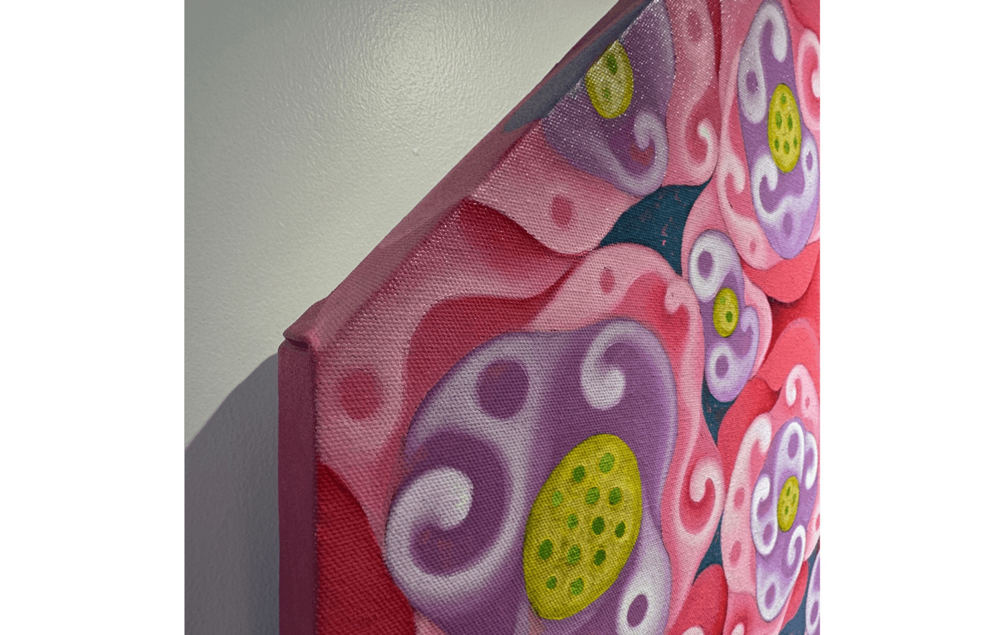 Close-up view of the Pink Lotus (2022) oil painting by Chalah Chaveesuk, highlighting floral patterns and vibrant colors.